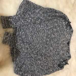 White and black, waffle knit sweater.